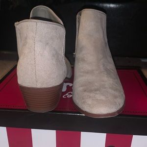 Only worn once, there is a tiny scuff mark